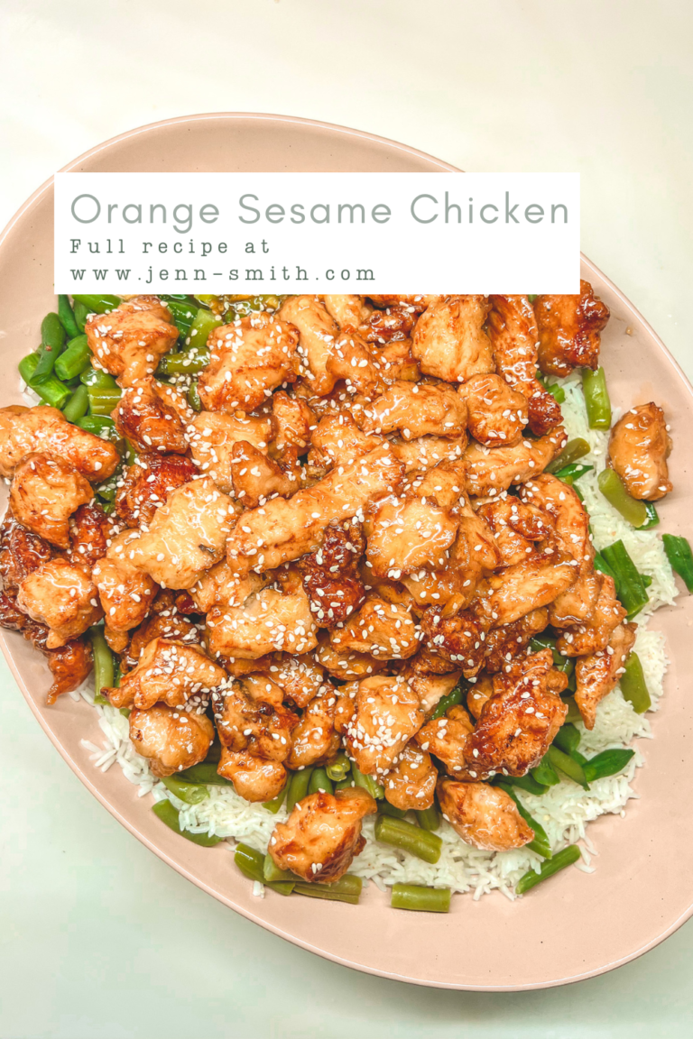 Sesame Orange Chicken Featured Image. The image is of Sesame Orange Chicken on top of green beans and White rice in a Mora Ceramics Serving Platter in Sesame Chai.