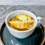 No Wine French Onion Soup with croutons on side view