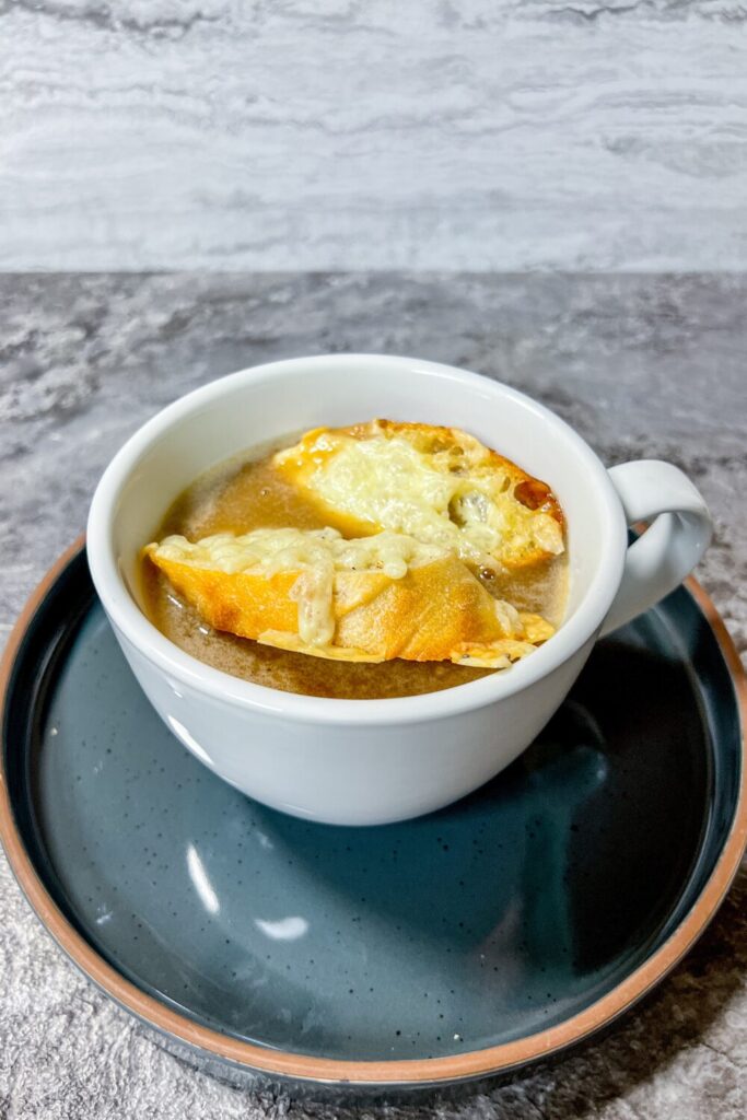 No Wine French Onion Soup with croutons on side view