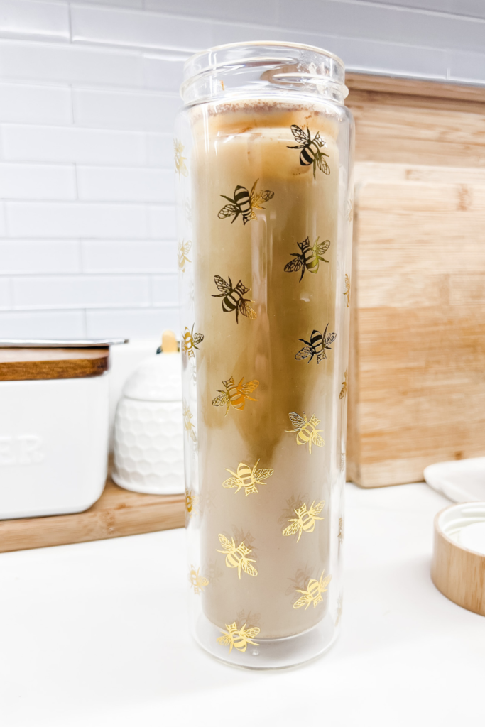 Iced Golden Milk Latte in a bee water bottle.