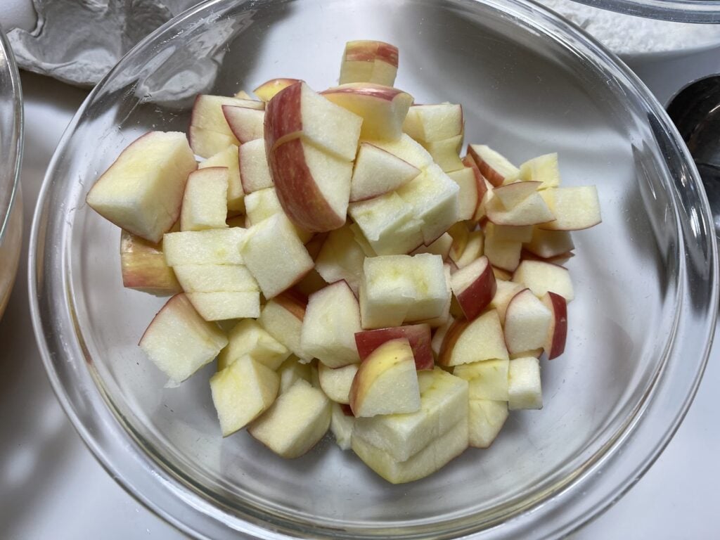chopped apples in a glass bowl