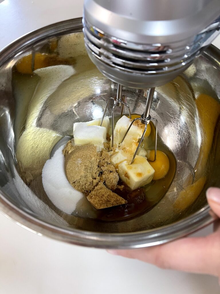 butter, sugars and eggs with hand mixer.