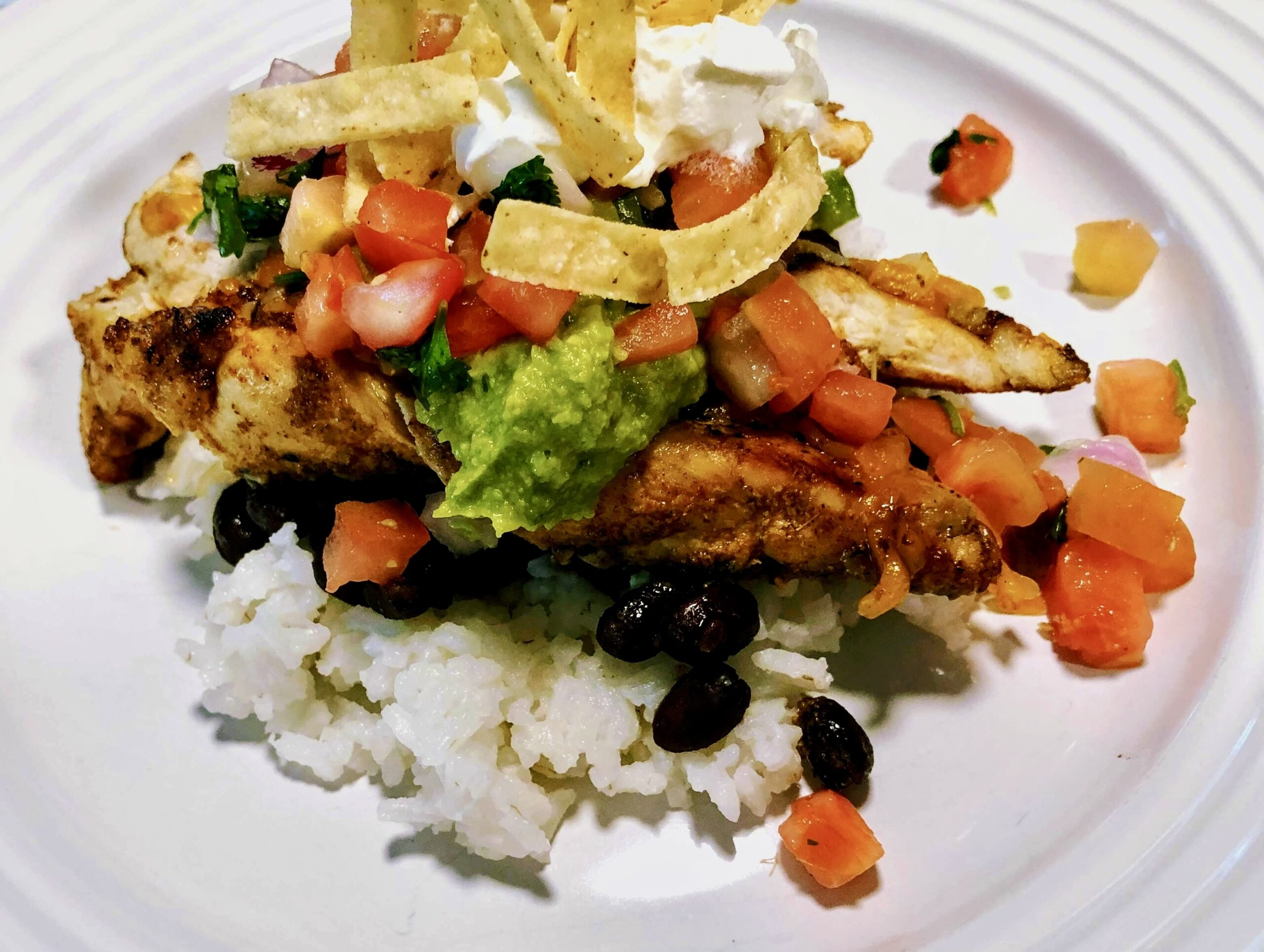 Lemon Chicken Taco Dinner on a white ceramic plate
