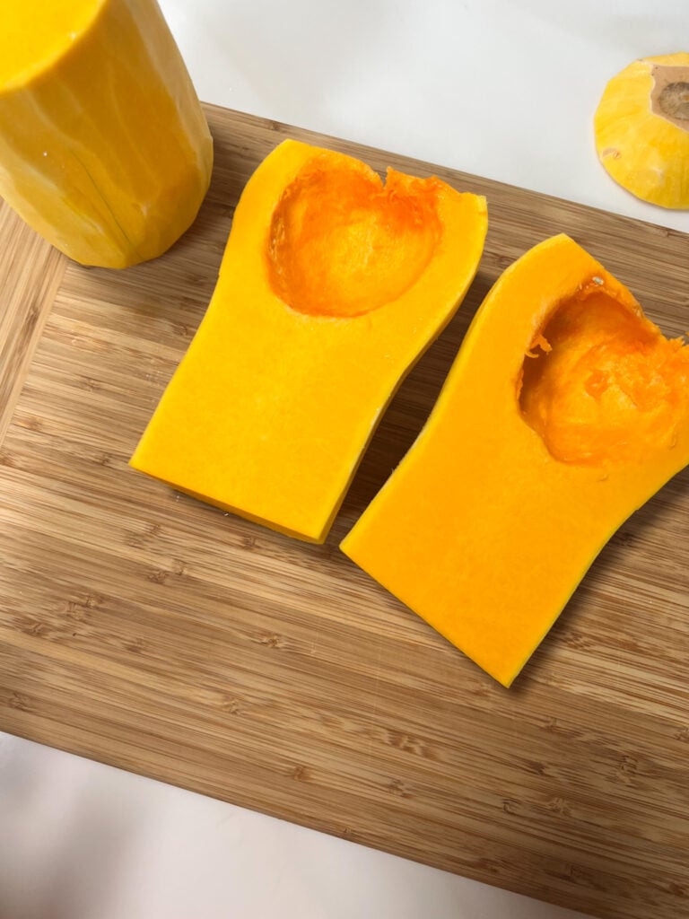 halved butternut squash with seeds already removed.