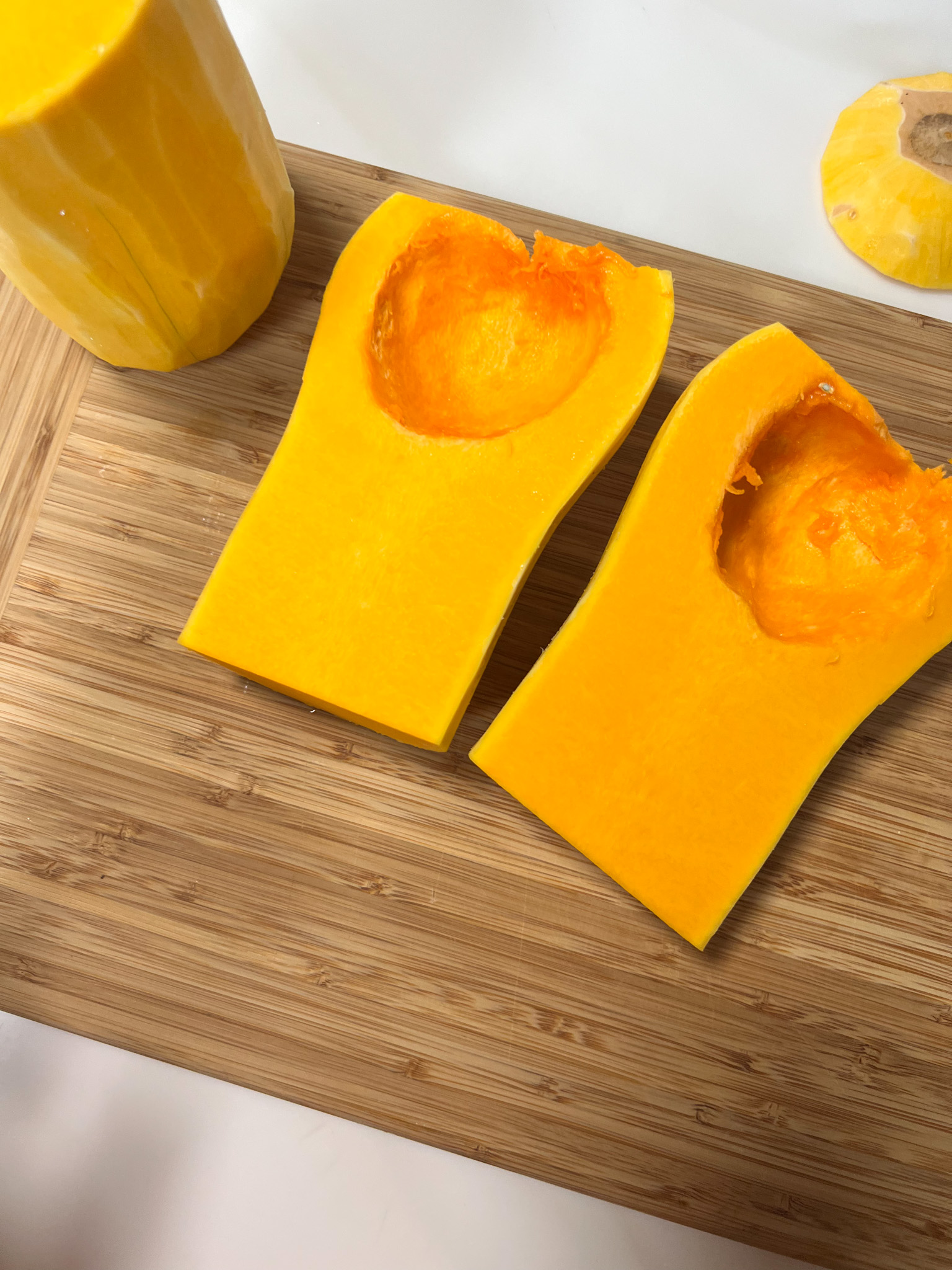 halved butternut squash with seeds already removed.