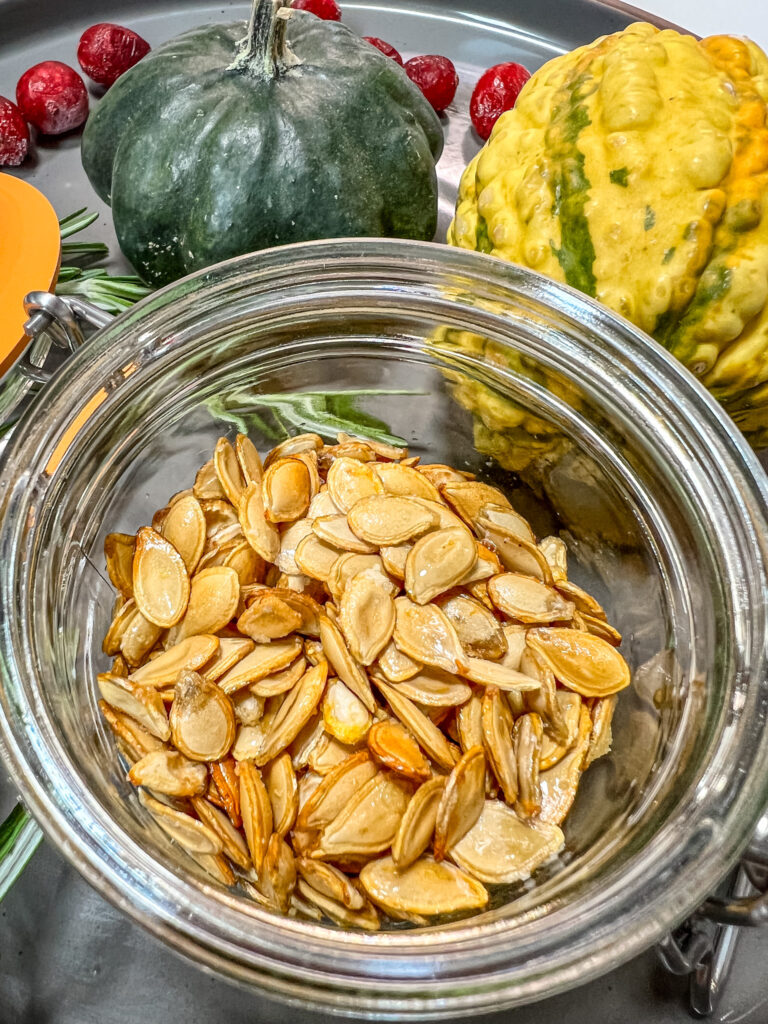 squash seeds up close in a jar