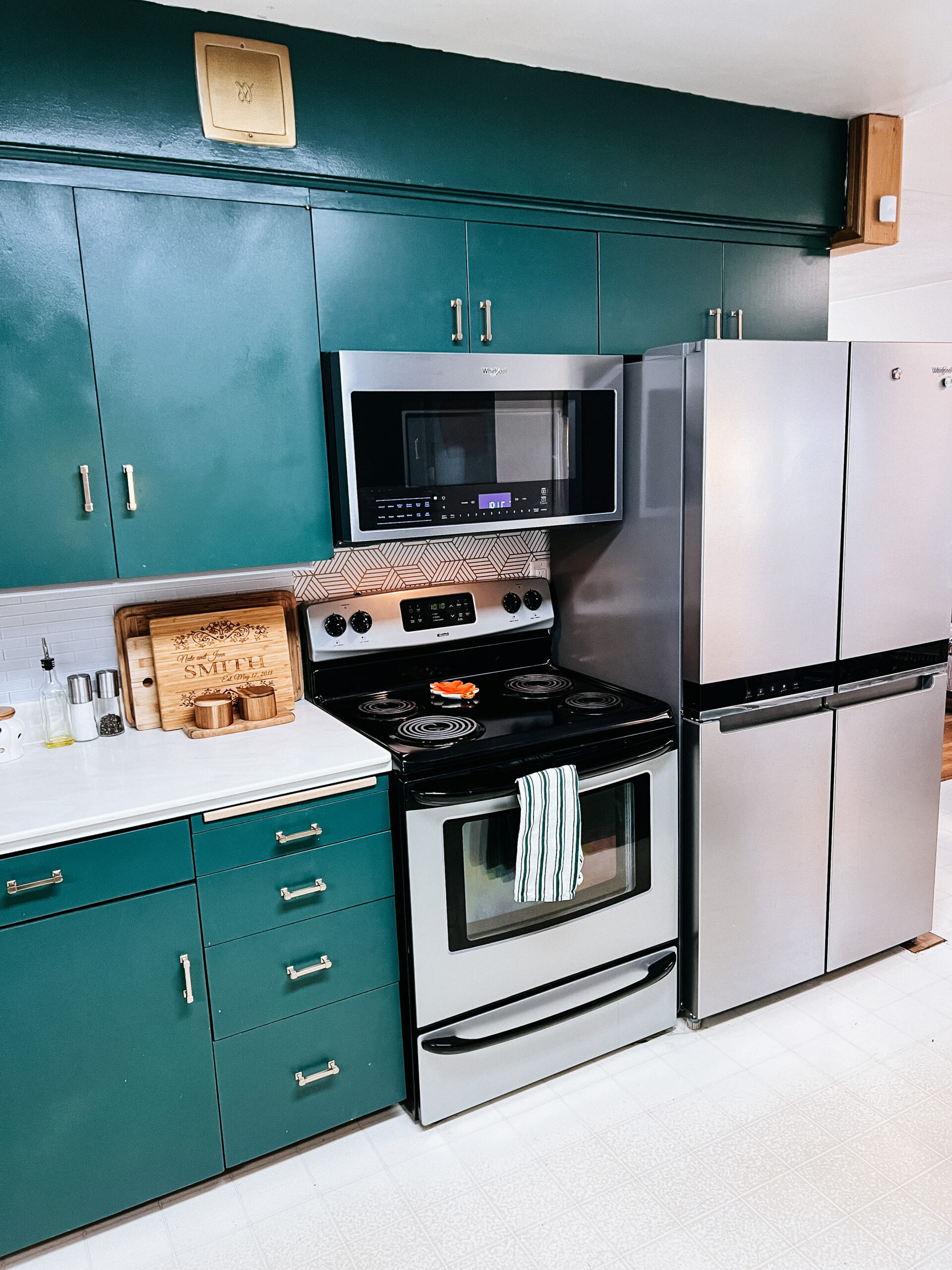 My kitchen cabinets, Microwave, stove and fridge.