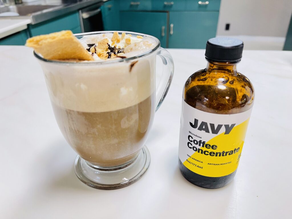 Finished S'mores coffee drink next to Javy Coffee conentrate