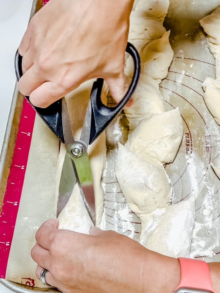 Cutting the dough at an angle.