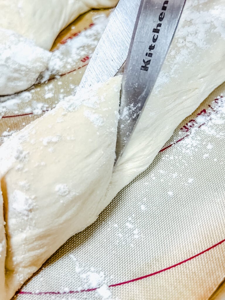 Close up of the dough cut. In angle, but not all the way through.