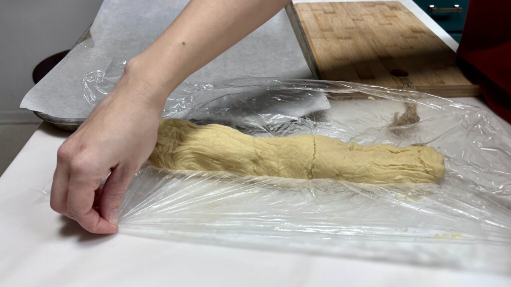 Frozen Chinese Almond Cookie Dough dough being unwrapped