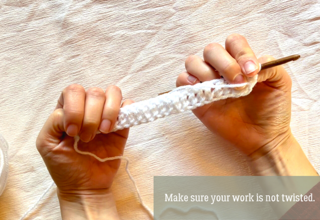 Image of explanation 1; holding the foundation double Crochet Straight.