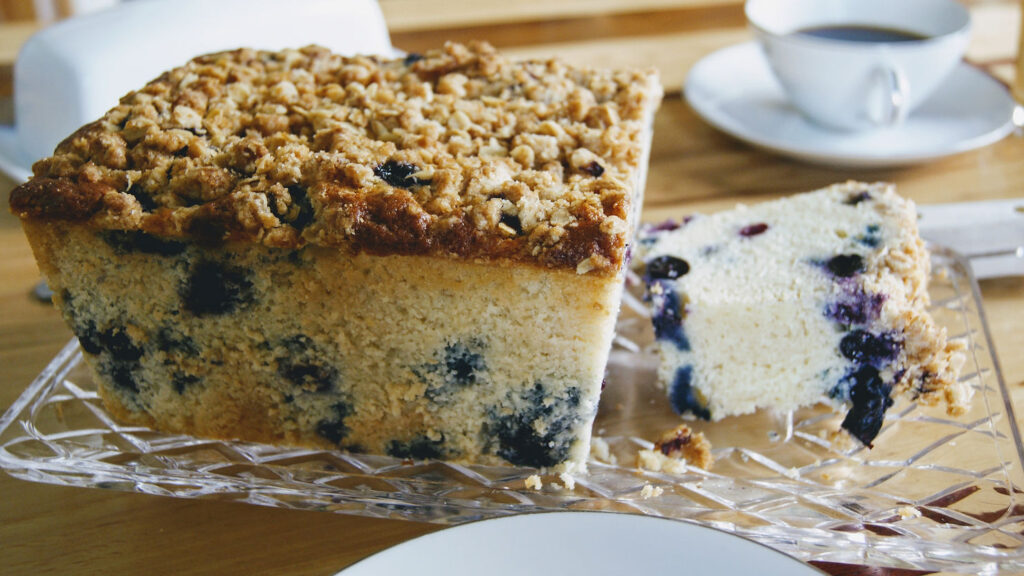 No Lemon - Blueberry Crumble Coffee Cake With a slice cut.