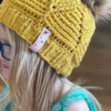 Birch Leaf Beanie toddler size with pom worn by blong child with blue glasses