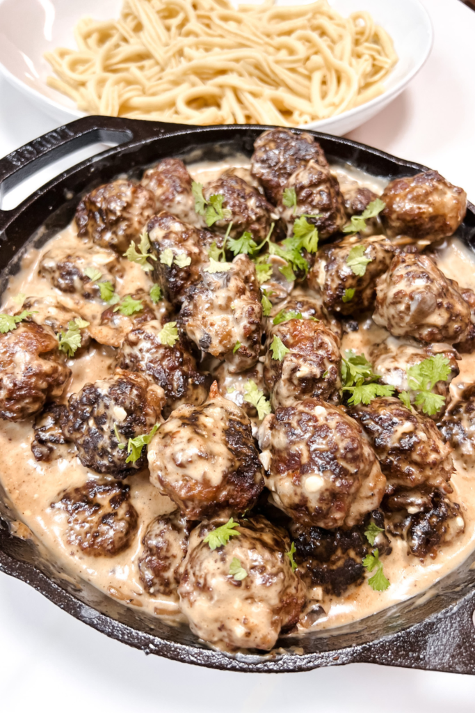 Meatballs in Mushroom Gravy close up with parsley