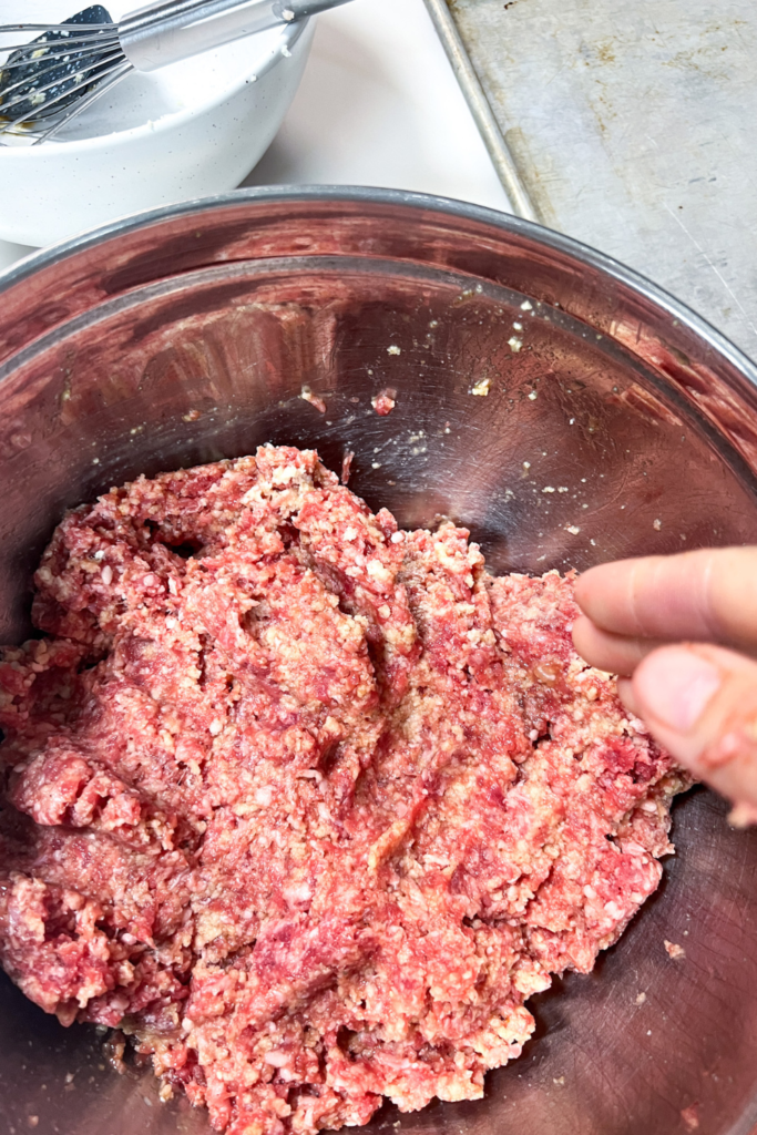 the meatball mixture after being mixed.
