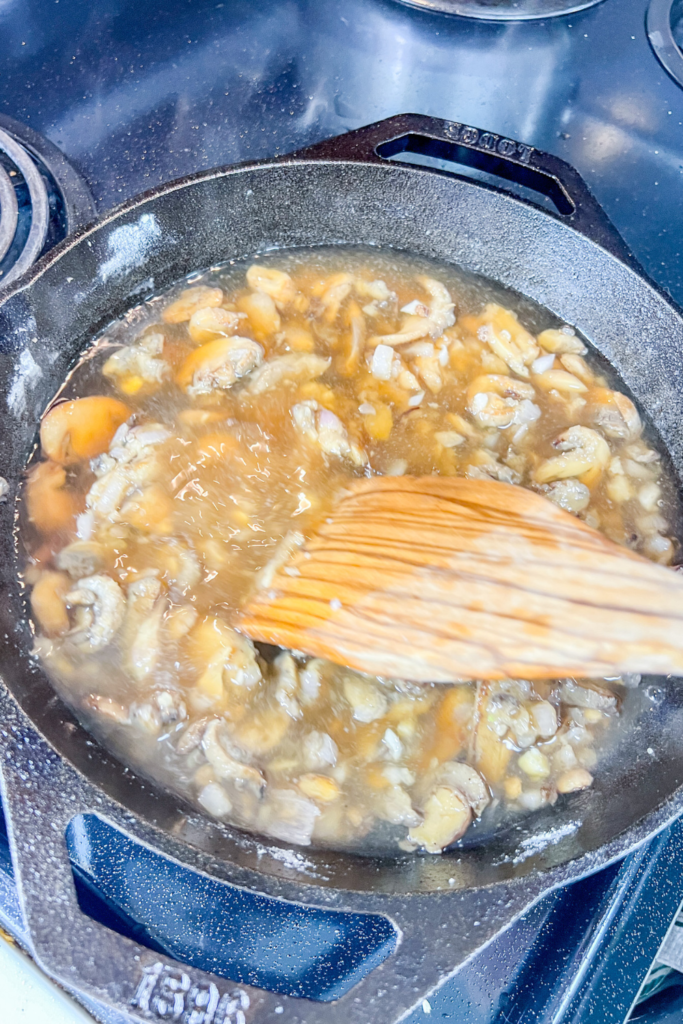 stirring the stock in.