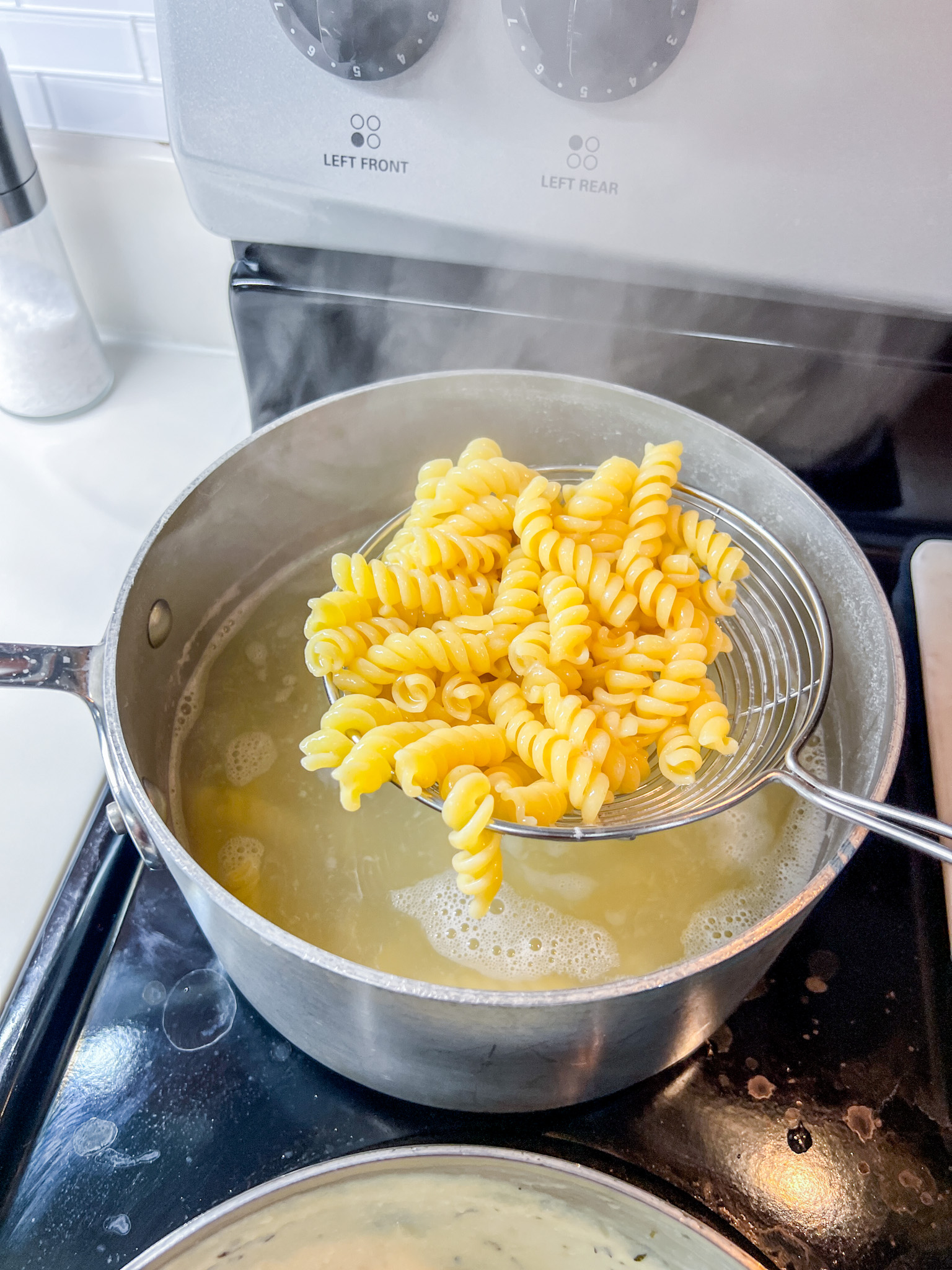 image #1 cooked pasta out of the water