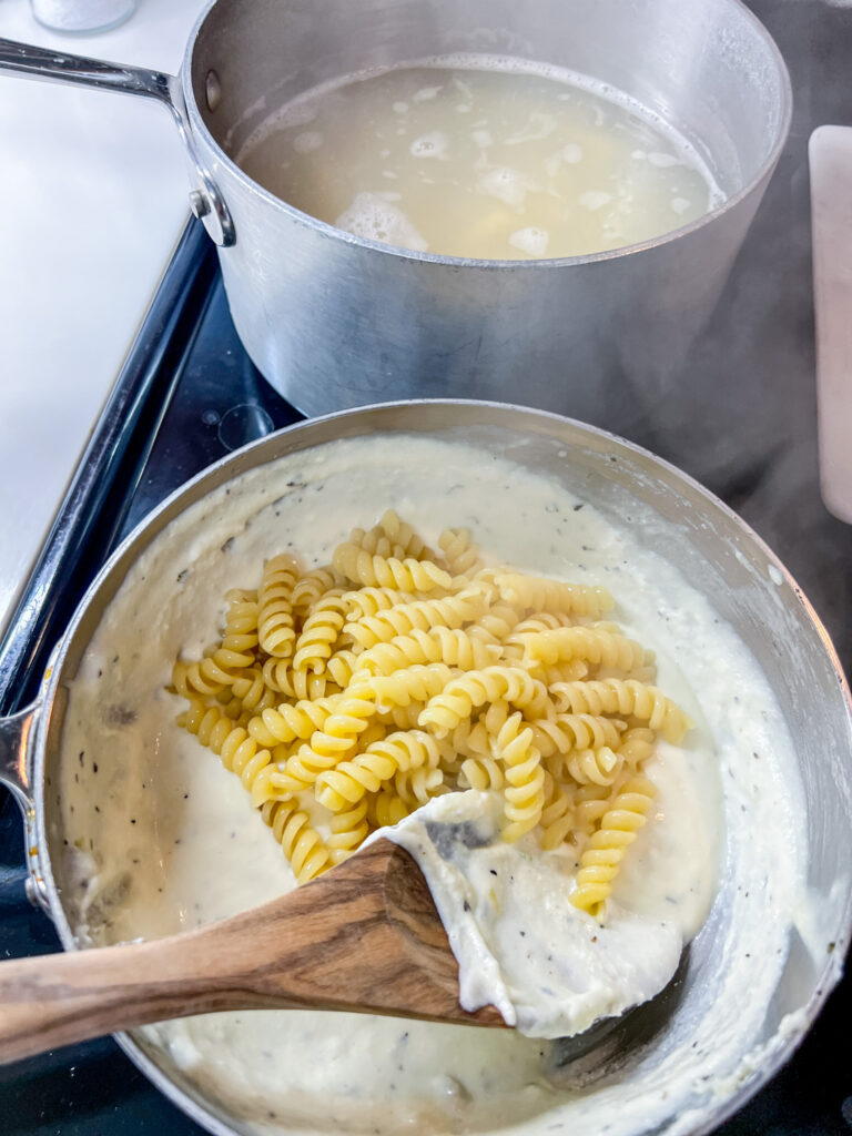 cooked pasta added to the sauce