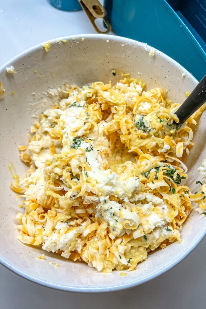 Mashed potato pancake mixture in a bowl