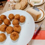 finished arancini on a plate.