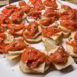 close up of close and bagels using cheese instead of cream cheese.