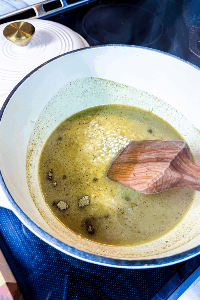 broth and seasoning added to cooked risotto