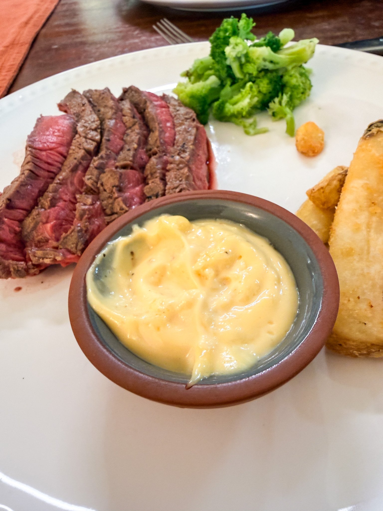 shortcut garlic aioli served with steak potatoes and broccoli