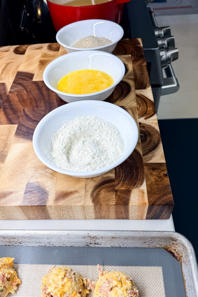 Shaped ham croquettes ready for breading and frying